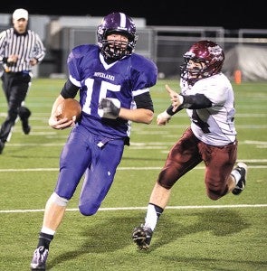 Grand Meadow's Trenton Bleifus busts off a run in the third quarter against Mountain Lake Area in the Minnesota State Nine-man Tournament last season in Rochester. -- Herald File Photo