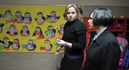 Woodson Kindergarten principal Jessica Cabeen talks with Commissioner Brenda Cassellius from the Department of Education.