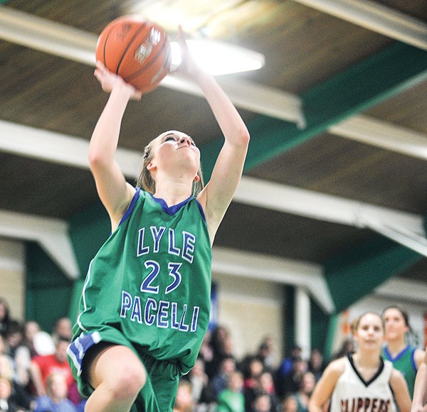 Lyle-Pacelli's Brooke Walter gets a layup in the first half against Cleveland Thursday night during the first round of the Section 1A West Division tournament at Pacelli.