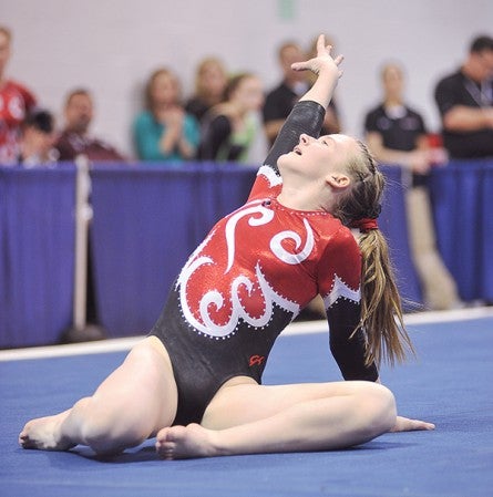 Austin's Maddie Mullenbach performs on the floor during the Class A Minnesota State Gymnastics Meet individuals Saturday at the University of Minnesota's Sports Pavilion.