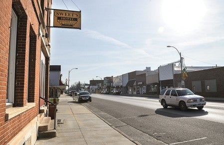 A vehicle drives by Sweet's Hotel in LeRoy, a still popular place to eat or have a drink in LeRoy.