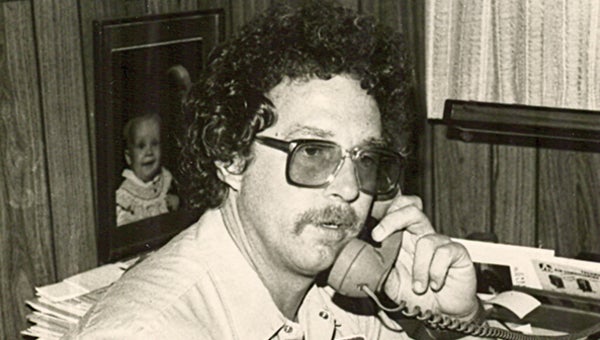 Jim Grunewald, who worked in heating and cooling systems since he was 14, talks to a client on the phone.  Photo provided