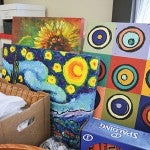 Original paintings by Pacelli students are some of the items that will be up for bids at this year's Pacelli benefit auction Saturday night.