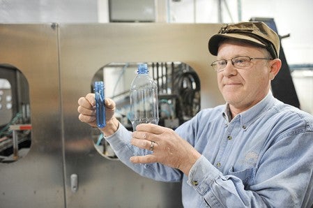 Not only is water bottled at Artesian Fresh, but they make their own bottles, taking plastic preforms and using air to shape them into the bottles.