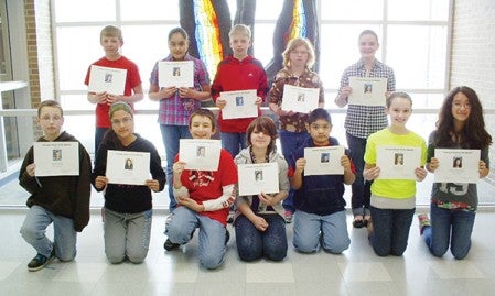 Thirteen Ellis Middle School students were recognized as Young Citizens in April for the characteristic “trustworthy.” Back row, from left: Nate Murphy, Yesenia Hernandez Ramirez, Simon Hirst, Elizabeth “Izzie” Tufte, Madison Lang, Troy Oldenkamp. Front row: Lizet Becera, Tedd Lund, Darien Schroeder, Alan Martinez, Emily Toland, Isabella Truong-Ferreira. Not pictured: Ian Murphy. Photo provided 