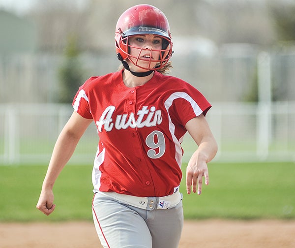 Austin's Cassidy Bawek moves up to third during the third inning against Rochester Mayo Tuesday evening at Todd Park. -- Eric Johnson/photodesk@austindailyherald.com