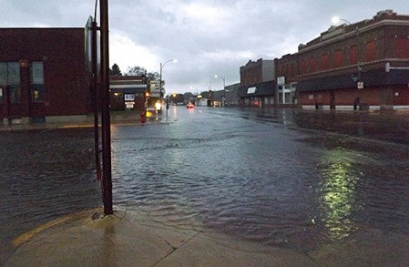 Downtown Adams was underwater Sunday night, but sandbagging kept water out of many businesses. -- Photo provided