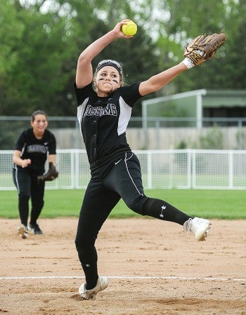 Blooming Prairie's Shelbi Swenson delivers in the first inning against Kenyon-Wanamingo during the Section 1A West Division championship Friday night at Todd Park.
