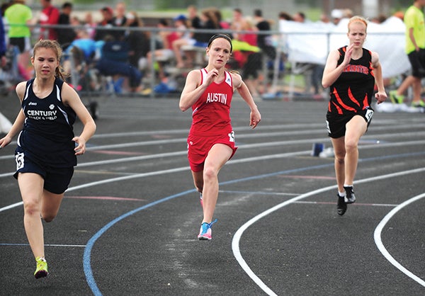 Haley Splinter, a senior sprinter from Austin, competes in the 400-meter dash Thursday at the Section 1AA track and field meet at Lakeville South High School. — Micah Bader/Albert Lea Tribune.