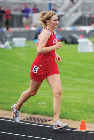 McKenzie Besel, a senior distance runner from Austin, competes in the 3,200-meter run Thursday at the Section 1AA track and field meet at Lakeville South High School. — Micah Bader/Albert Lea Tribune.