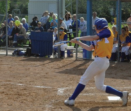 Hayfield's Dani Wagner launches a solo homer in the Vikings' 13-3 win over Waterville-Elysian-Morristown in the Section 1A West Division tournament opener this past spring. --Herald File Photo