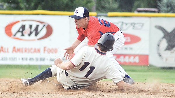 The Austin Blue Sox Luke Anderson puts the tag down on Greyhounds runner John Frein on a stolen base attempt in the top of the third inning Saturday at Marcusen Park.