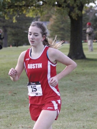Austin's Madison Overby runs at the Section 1AA cross country meet Thursday at Brooktree Golf Course in Owatonna. -- Drew Claussen/Albert Lea Tribune