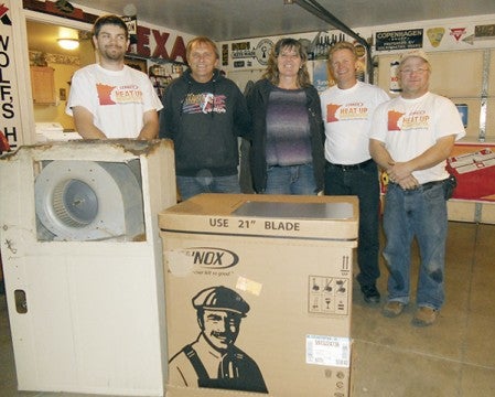 One area couple received a brand-new furnace this holiday season. Kevin and Dianne Jorgenson were chosen as the recipients of a new Lennox furnace as part of the Heat Up Minnesota campaign.  The furnace was donated by Lennox Industries, and Greenman Heating installed the furnace. This is the second year Lennox Industries has donated 100 furnaces to families in need throughout Minnesota.  Stories of people in need are submitted online, and a committee reads every story to determine who is deserving.  Photo provided