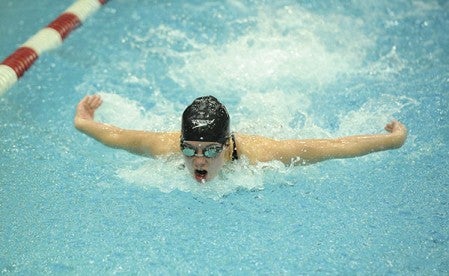 Merideth Fritz of Austin swims the 100-yard butterfly Friday during the Section 1A finals at the Rochester Recreation Center.-- Micah Bader/Albert Lea Tribune