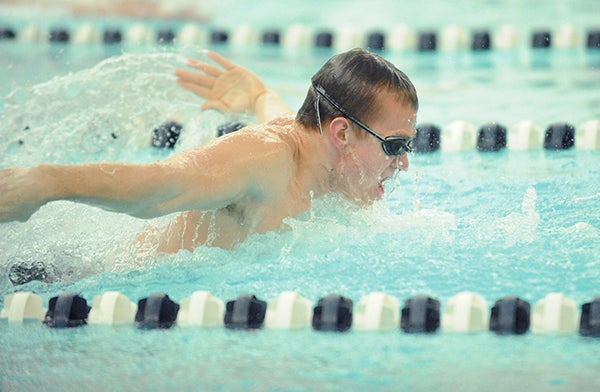 Ben Carroll of Austin swims the 200-yard individual medley Thursday at Albert Lea. Carroll took third place in the event. -- Micah Bader/Albert Lea Tribune
