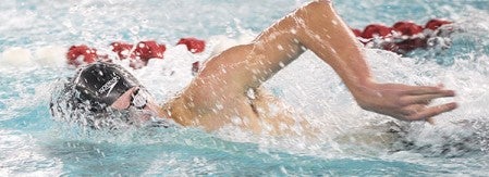 Austin’s Craig Heimark swims in the 200 yard freestyle Saturday during the Packer Invitational.