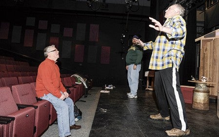 Director Jerry Girton and actors Mike Compton and Jason Howland shore up a scene from “Guys on Ice.”