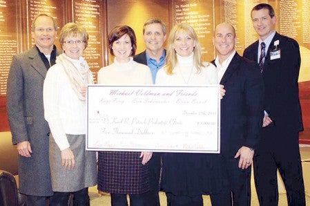 From left: Dr. Kurt and Brenda Potach; Michael Veldman and Friends’  performers Erin Schumacher, Brian Bawek, Kaye Perry, and Michael Veldman; and Mark Ciota, M.D., CEO, Mayo Clinic Health System – Albert Lea and Austin. Photo provided 