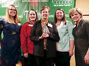 Staff from CRC accepted the 2014 Refreshed Business of the Year award at the Austin Chamber of Commerce’s annual meeting and awards banquet. Photo provided
