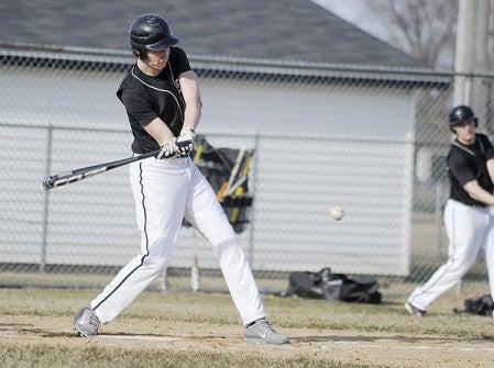 Blooming Prairie's John Rumpza swings on a pitch in the second inning against Southland Friday in Blooming Prairie. Eric Johnson/photodesk@austindailyherald.com