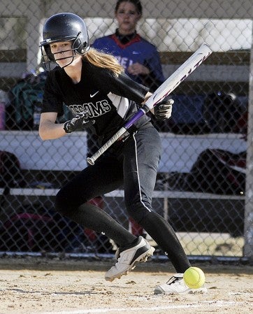 Blooming Prairie's Tessa Ivers watchers her bunt go foul in an at-bat in the first inning against Southland Friday. Eric Johnson/photodesk@austindailyherald.com
