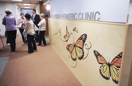 The butterfly wall is one of the first things to greet families at the Karl R. Potach Pediatric Clinic.