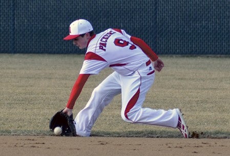 Austin shortstop Nate Conner scoops up a ground ball in Dick Seltz Field. -- Rocky Hulne/sports@austindailyherald.com