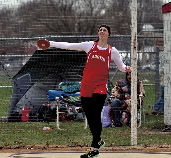 Austin's Amber Hansen competes in the discus at the Packer invite at Larry Gilbertson track and field Saturday. -- Rocky Hulne/sports@austindailyherald.com