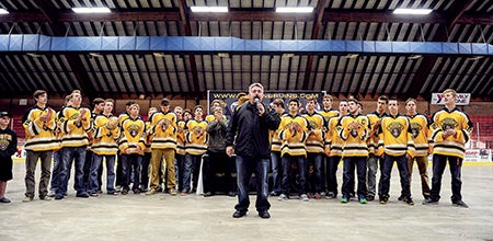 Austin Bruins owner Craig Patrick addresses and thanks the crowd during a welcome home for the team Wednesday night at Riverside Arena.