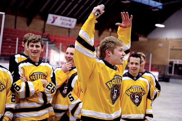 The Bruins’ Brian Backnak gets the crowd fired up one more time during a welcome home for the Bruins Wednesday night at Riverside Arena. -- Photos by Eric Johnson/photodesk@austindailyherald.com