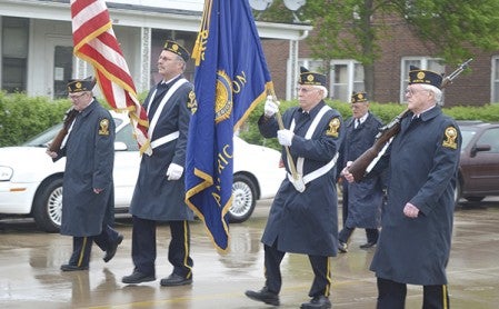 The American Legion Post 91 color guard marches in the Memorial Day Parade in 2014. Herald file photo