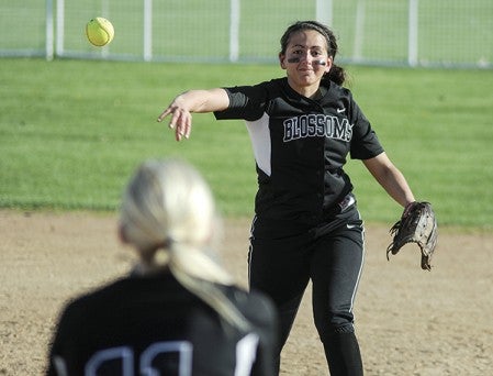 Blooming Prairie second baseman Delaney Nelson throws to first for the out in the sixth inning against Kenyon-Wanamingo in the Subsection 1A tournament Friday at Todd Park. Eric Johnson/photodesk@austindailyherald.com