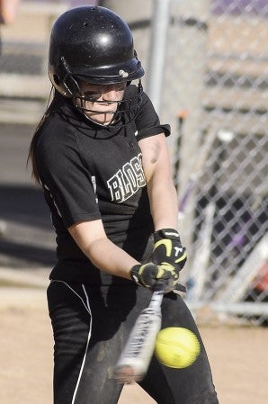 Blooming Prairie's Bria Baldwin connects in the sixth inning against Kenyon-Wanamingo in the Subsection 1A tournament Friday at Todd Park. Eric Johnson/photodesk@austindailyherald.com