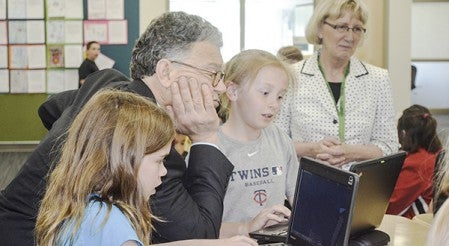 Catrina Herr shows Sen. Al Franken her power point for a “Cause and Effect” video that the students were working on. Franken visited I.J. Holton on Wednesday to look at the school’s STEAM curriculum approach. -- Photos by Jenae Peterson/jenae.peterson@austindailyherald.com