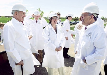Governor Mark Dayton, from left, Senator Amy Klobuchar and Sen. Al Franken share a laugh before the groundbreaking for the Hormel Institute expansion Wednesday afternoon. 