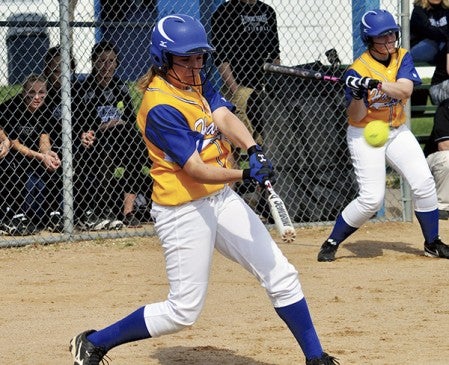 Hayfield's Kyal Heydt connects on one of her two homers for the Vikings in Hayfield Wednesday. -- Rocky Hulne/sports@austindailyherald.com