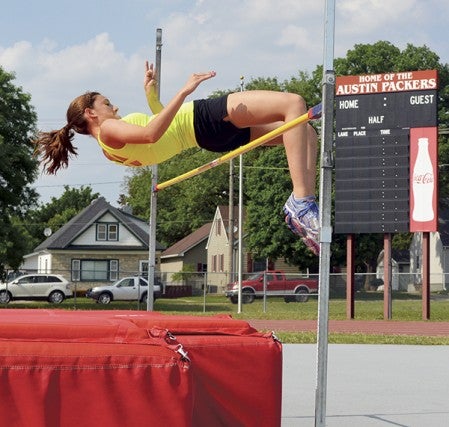 Lyle-Pacelli's Sarah Holtz practices her high jump at Larry Gilbertson Track and Field Friday. Holtz will compete in the Class A state track and field meet in the high jump Friday at 3:30 p.m. in Hamline University. -- Rocky Hulne/sports@austindailyherald.com