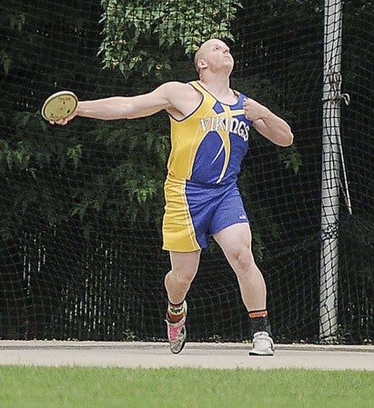 Hayfield's Cody Carpentier makes his first throw in the finals of the Class A shot put Saturday in the Minnesota State Track and Field Meet at Hamline University in St. Paul. Eric Johnson/photodesk@austindailyherald.com