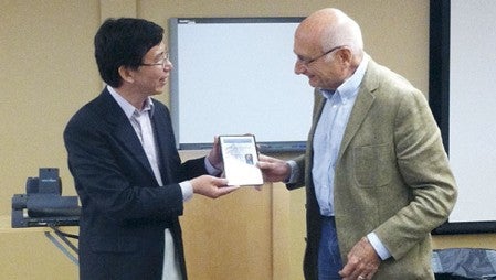 The Hormel Institute’s Executive Director Dr. Zigang Dong presented a special recognition Tuesday afternoon to Dr. Peter Vogt, a cancer research pioneer whose groundbreaking work helped establish the field of cancer genetics. He gave a seminar on his work and heard presentations by HI scientists.  Photo provided