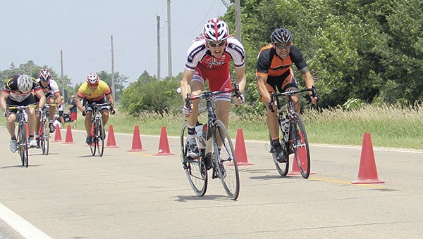 The leaders of the 25-mile Dan Ulwelling Bike Race approach the finish line in 2013 outside the Jay C. Hormel Nature Center. 