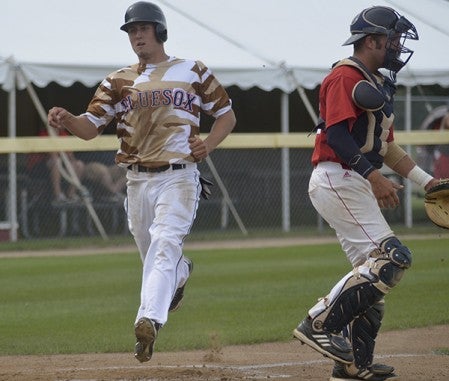 Cody Meyer scores in the first inning for the Austin Blue Sox. -- Rocky Hulne/sports@austindailyherald.com