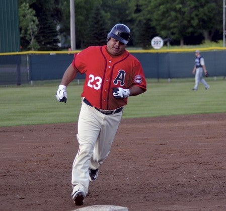 Matt Cano of the Austin Greyhounds rounds third base after hitting a grand slam in the SpamTown Challenge in Marcusen Park Friday. -- Rocky Hulne/sports@austindailyherald.com