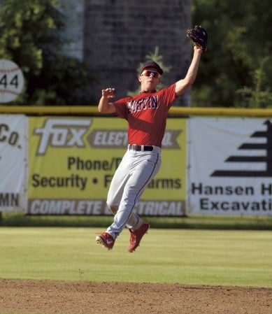 Daniel Bollingberg makes a leaping catch at shorstop for Austin Post 1216 agaisnt Stewartville in Marcusen Park Wednesday. -- Rocky Hulne/sports@austindailyherald.com