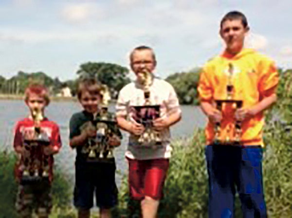 Mason Step, Jacob Schmidt, Cole Schmidt and Joseph Maas were the winners of the Kids Fishing contest of Freedom Fest. -- Photo provided