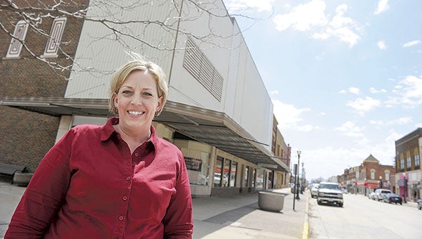 Sarah Douty, executive director of the Main Street Project, stands in front of Raymond James on North Main Street this past May. The Main Street Project has announced it will be shutting down. Herald file photo