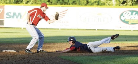 Austin's Isaac Schumacher slides into second base against the Rochester Patriots in Marcusen Park Tuesday. -- Rocky Hulne/sports@austindailyherald.com