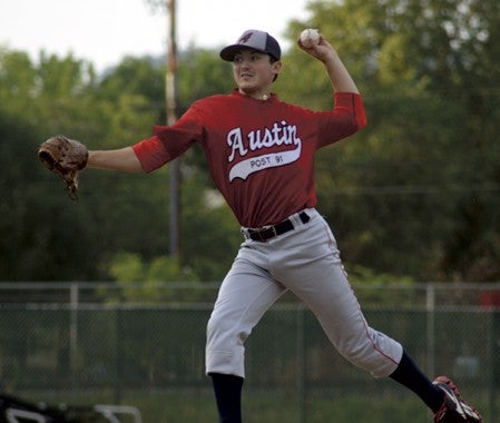 Isaac Schumacher throws a pitch for Austin Post 91 in Winona Thursday. -- Rocky Hulne/sports@austindailyherald.com