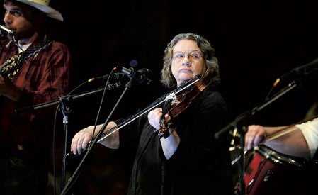 Sylvia Davis plays the fiddle with Full Circle during the Hanson Family and Friends Concert May 17 at Riverland Community College.  Herald file photo