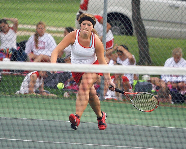 Austin's Maggie Leif closes in on a ball in her No. 3 singles match at Red Wing Tuesday. -- Joe Brown/Red Wing Republican Eagle
